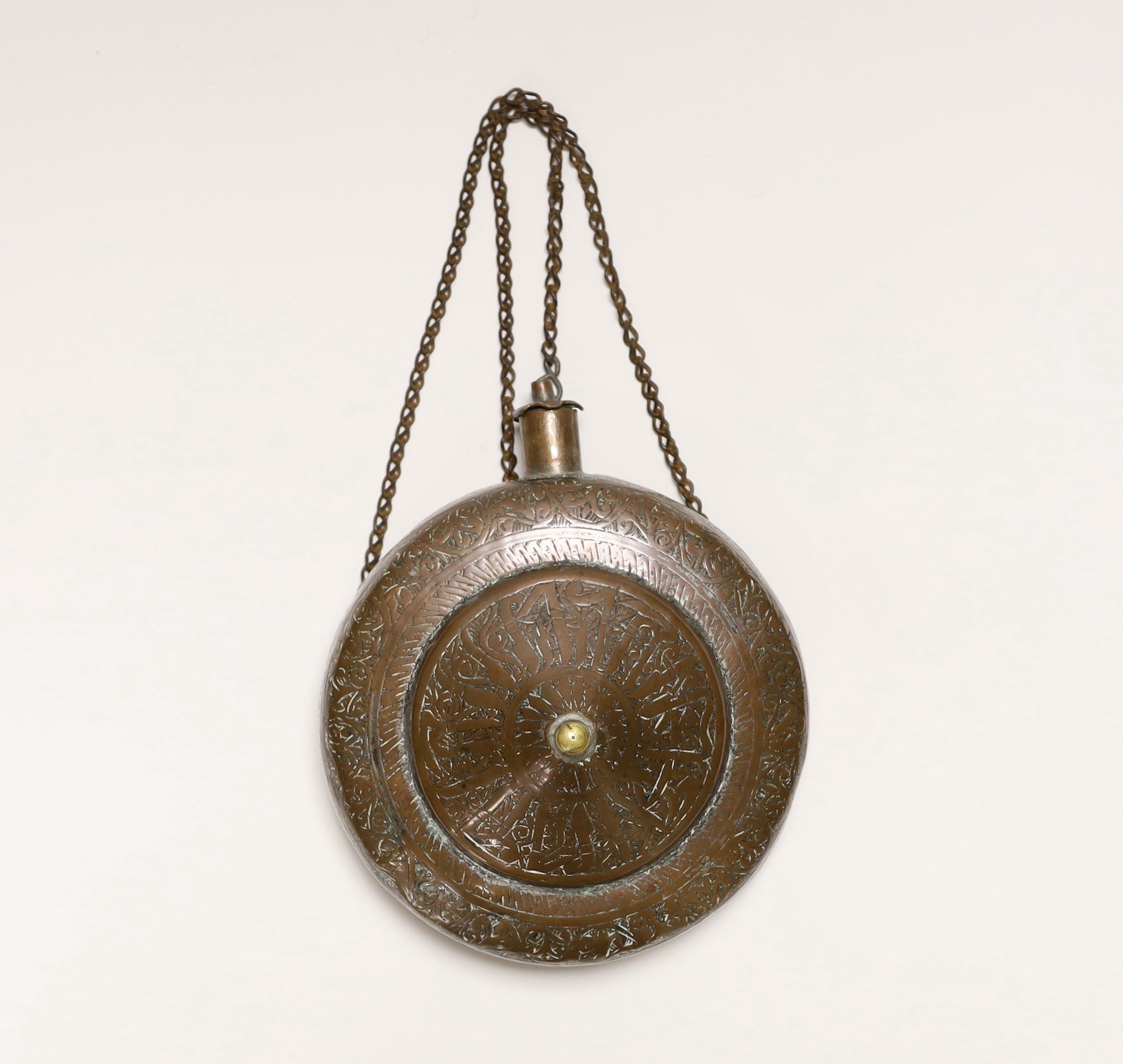 An Ottoman Empire copper water flask with incised decoration, 21cm high